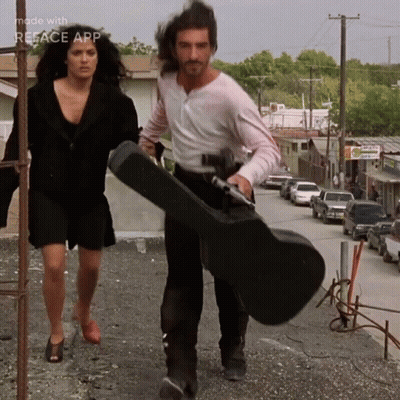Man And Woman Walking Down Street Made With Reface App GIF