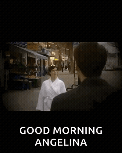 Man And Woman Walking Down Street Saying Good Morning Angelina GIF