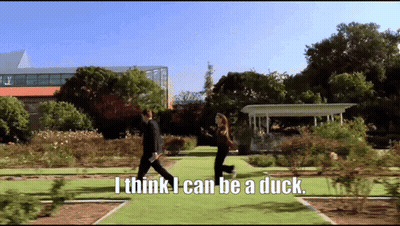 Man And Woman Walking Saying I Think I Can Be A Duck GIF