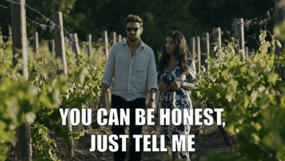 Man And Woman Walking Through Vineyard Saying You Can Be Honest GIF