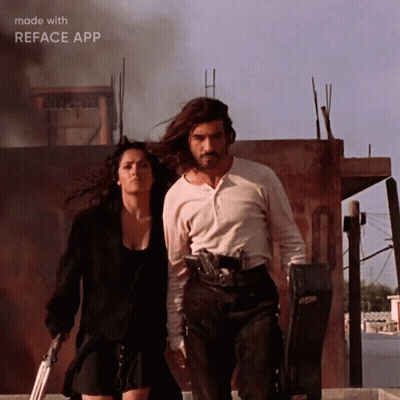 Man And Woman Walking With Guns GIF