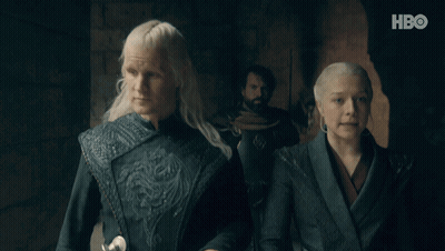 Man And Woman Walking With HBO Logo GIF