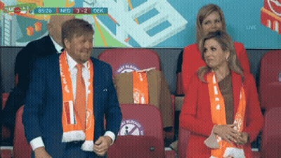 Man And Woman Watching Soccer In Stadium GIF