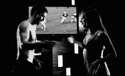 Man And Woman Watching TV GIF