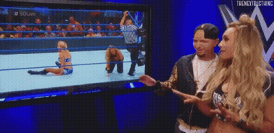 Man And Woman Watching Wrestling GIF