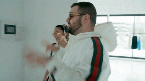 Man And Woman Wearing Sunglasses Dancing GIF