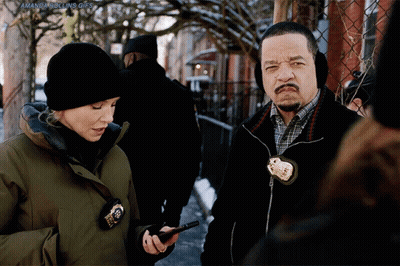 Man And Woman With Amanda Rolling Badge GIF