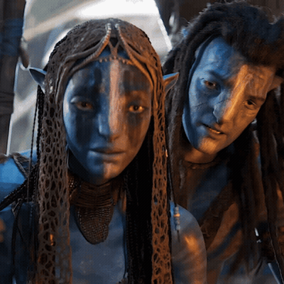 Man And Woman With Blue Faces Posing GIF