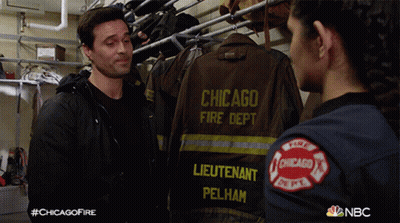 Man And Woman With Chicago Fire Pelham Jacket GIF