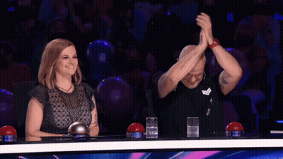 Man And Woman With Hands In Air GIF