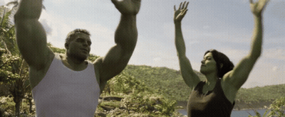 Man And Woman With Hands In The Air GIF
