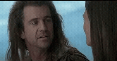 Man And Woman With Long Hair Looking In Movie GIF