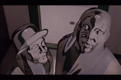 Man And Woman With Painted Faces GIF