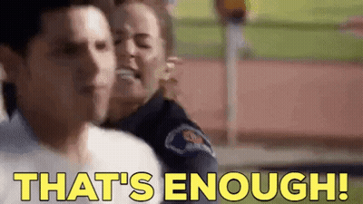 Man And Woman With Police Officer Saying That's Enough GIF