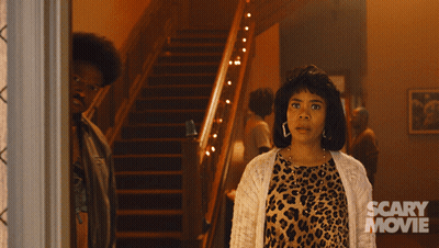 Man And Woman With Scary Movie Text GIF
