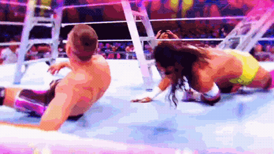 Man And Woman Wrestling In Ring GIF