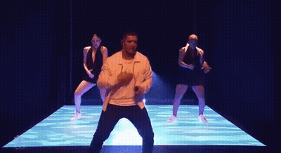 Man And Women Dancing On Stage GIF