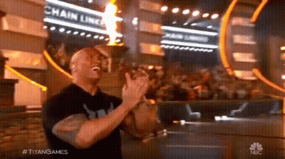 Man Applauding In Front Of Chain Link Sign GIF