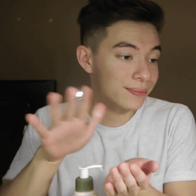 Man Applying Lotion To Hand GIF