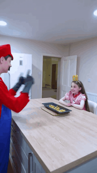 Man As Mario Playing With Little Girl GIF