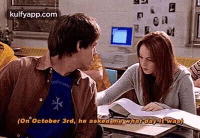 Man Asking Woman What Day It Was In Classroom GIF