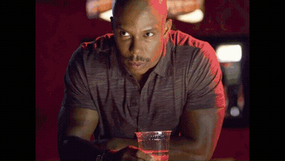 Man At Bar Holding Plastic Cup Of Water GIF