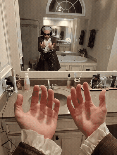 Man At Bathroom Sink With Hands Up GIF