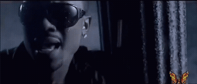 Man At Blue House With White Picket Fence GIF