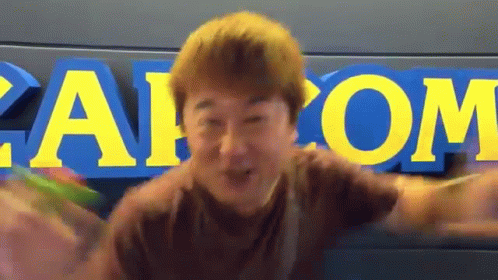 Man At Capcom Sign GIF