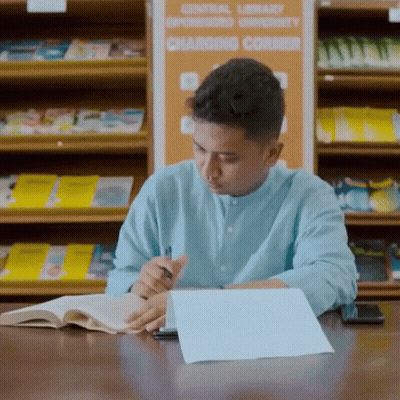 Man At Central Library Charging Corner GIF