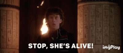 Man At Columns Says Stop She's Alive GIF
