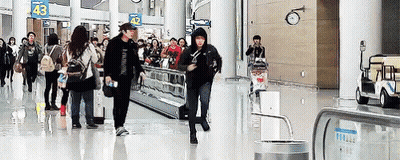 Man At Conveyor Belt With Star Saying ESID GIF