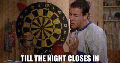 Man At Dart Board Till The Night Closes In GIF