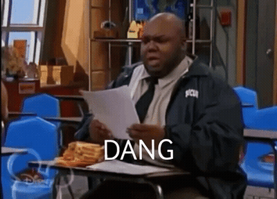 Man At Desk Holding Paper Saying Dang GIF