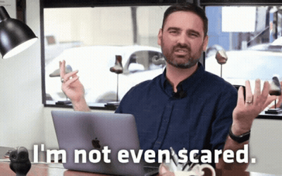 Man At Desk Saying I'm Not Even Scared GIF