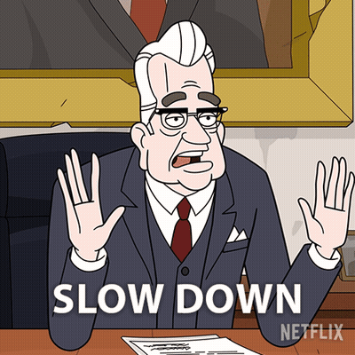 Man At Desk Saying Slow Down GIF