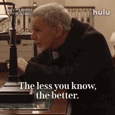 Man At Desk Saying The Less You Know The Better GIF