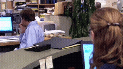 Man At Desk With Computer And Priority Mail Sign GIF