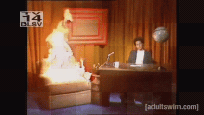 Man at Desk With Fire From Chair