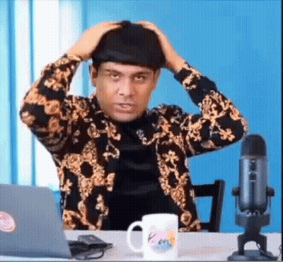 Man At Desk With Laptop And Microphone GIF