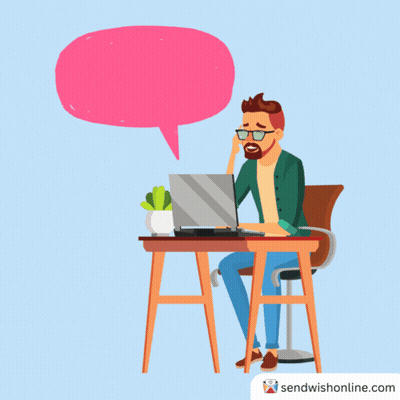 Man At Desk With Laptop And Pink Speech Bubble Say Sendwishonline.com GIF