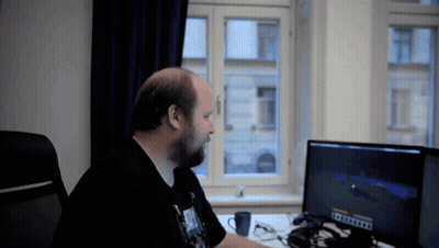 Man At Desk With Minecraft Screen GIF