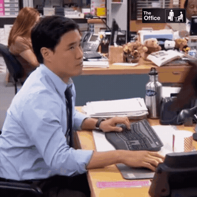 Man At Desk With The Office Sign GIF
