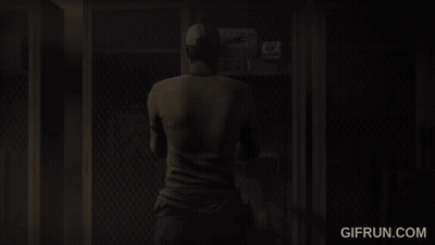 Man At Locker With Gifrun.com Logo GIF