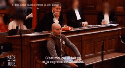 Man At Microphone In Courtroom With Face Juge GIF