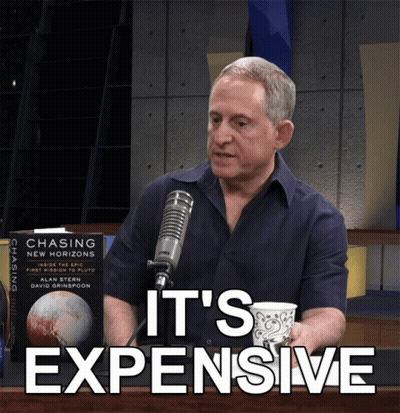 Man At Microphone Next To Book Chasing New Horizons By Alan Stern GIF