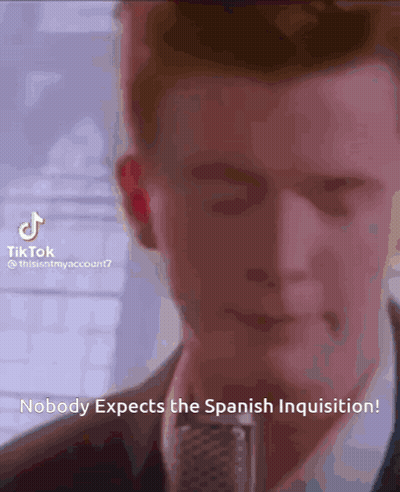 Man At Microphone: Nobody Expects The Spanish Inquisition GIF