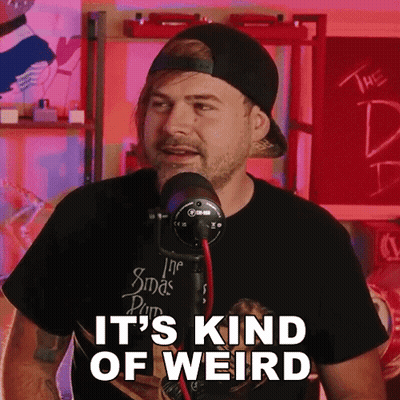 Man At Microphone Saying It's Kind Of Weird GIF