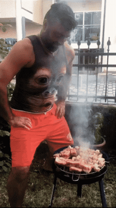 Man At Microphone Saying May God Bless America GIF