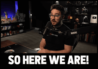 Man At Microphone Saying So Here We Are GIF